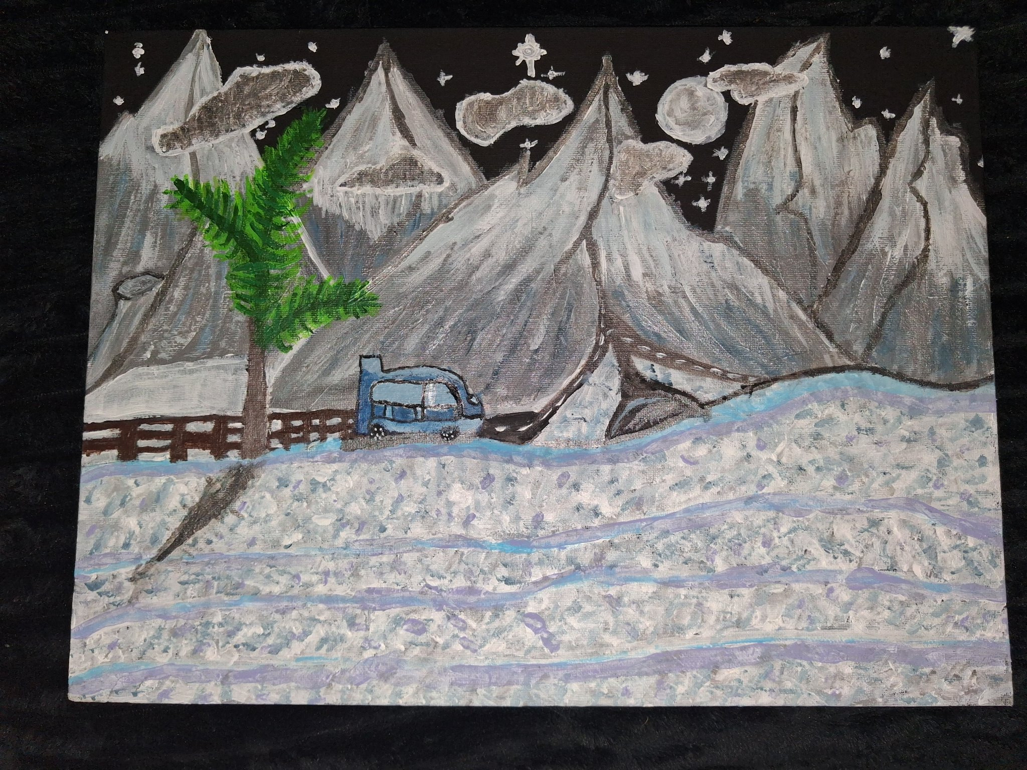 Winter Wonderland painting of snowy mountains and pine trees on a black canvas, with a blue van parked in the snow under the moon and stars